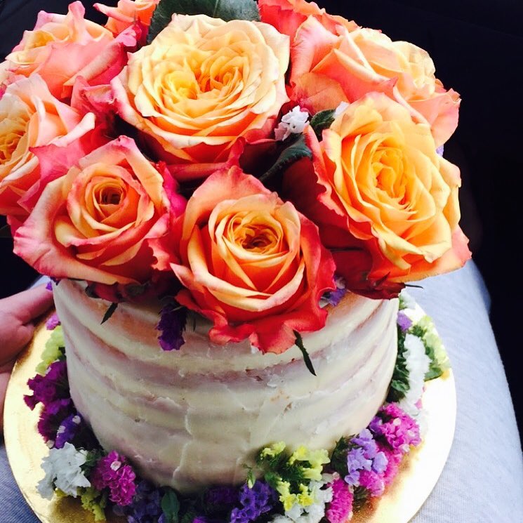 White ganache 50th Birthday cake for a mum who loves flowers.